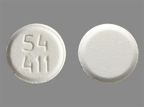 Tablet (8 mg) A white, hexagonal-shaped pill with "54 411" imprinted on one side. . 54 411 white round